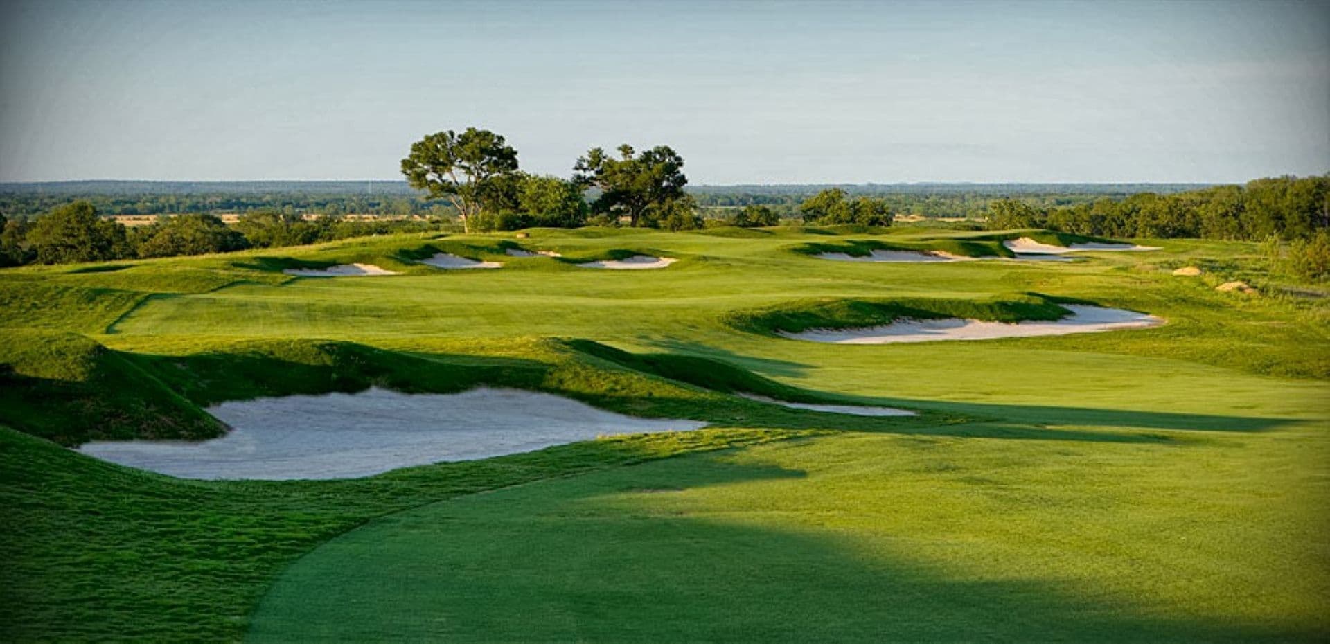 Golf course with green grass at Wolfdancer near Austin Condo